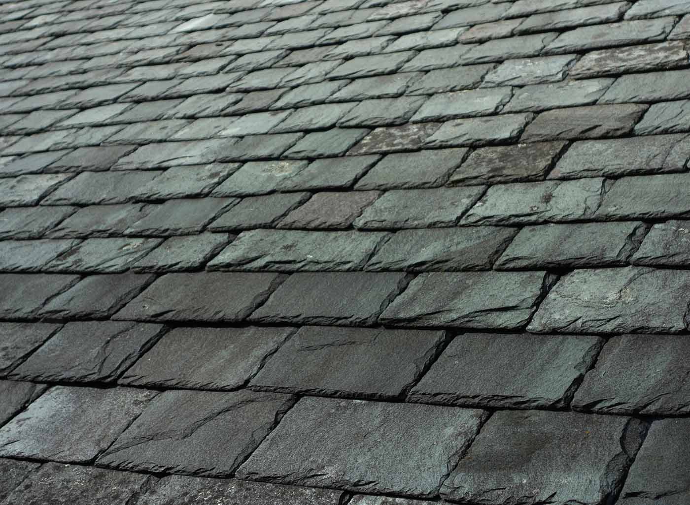 Close up of grey roof tiles on a roof
