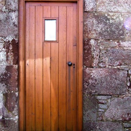traditional timber door with fan light