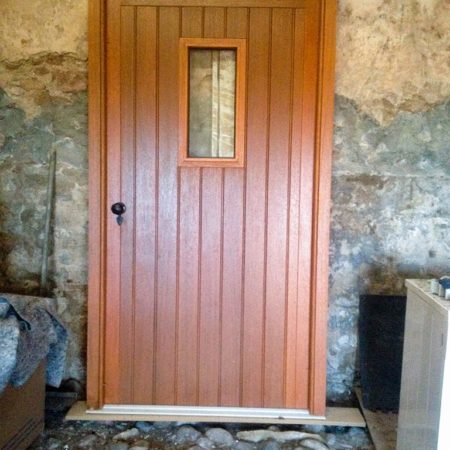 traditional timber door with fan light